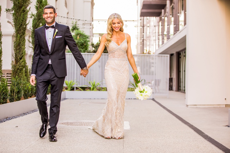 Bride and Groom Holding Hands
Photography: Laura Grier of Beautiful Day Photography
Read More:
http://www.insideweddings.com/weddings/glamorous-art-deco-inspired-wedding-in-downtown-los-angeles/1162/ bride in berta bridal gown and jewel headpiece holds hands with groom in tuxedo