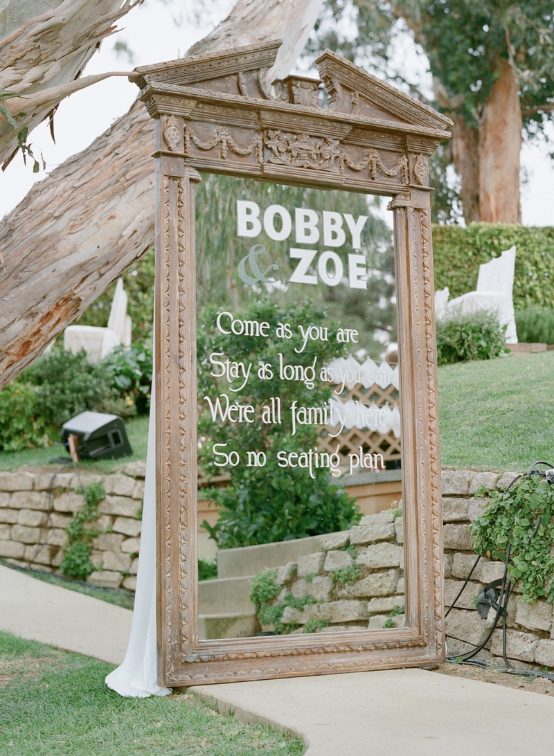 Mirror Ceremony Sign
Photography: Elizabeth Messina
Read More:
http://www.insideweddings.com/weddings/ethereal-garden-inspired-morning-ceremony-alfresco-brunch/582/ White text on large free-standing mirror at wedding ceremony