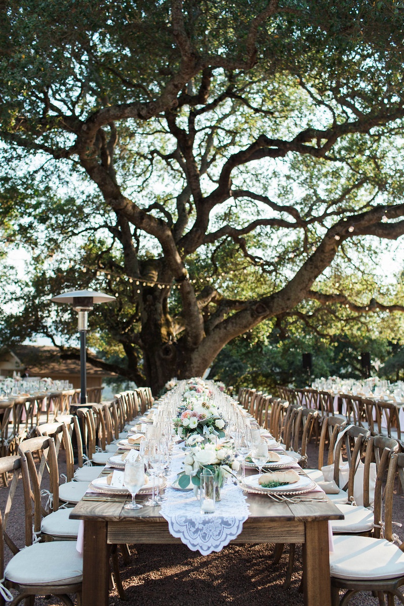 Long Wooden Tablescape, Fairy Lights
Photography: Katie Shuler Photography
Read More:
http://www.insideweddings.com/weddings/rustic-chic-outdoor-wedding-at-a-winery-in-northern-california/945/ long wooden tablescale fairy lights lace runner outdoor northern california wedding rustic