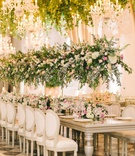 Garden-Inspired Colombia Reception
Photography: Elizabeth Fogarty
Read More:
http://www.insideweddings.com/weddings/destination-wedding-with-lush-garden-inspired-details-in-colombia/1215/ wedding reception checkerboard floor white chairs tables tall centerpiece greenery chandelier