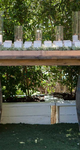 Escort Cards on Wine Barrels
Photography: Christine Bentley Photography
Read More:
http://www.insideweddings.com/weddings/pretty-pink-wedding-with-a-playful-butterfly-motif-in-malibu/1196/ wedding escort cards displayed on table of wine barrels, candles in glass hurricanes
