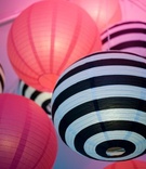 Modern Paper Lanterns
Photography: Couture Foto
Read More:
http://www.insideweddings.com/weddings/stacey-janks-and-eric-jasper/385/ Black-and-white striped paper lanterns and pink spheres