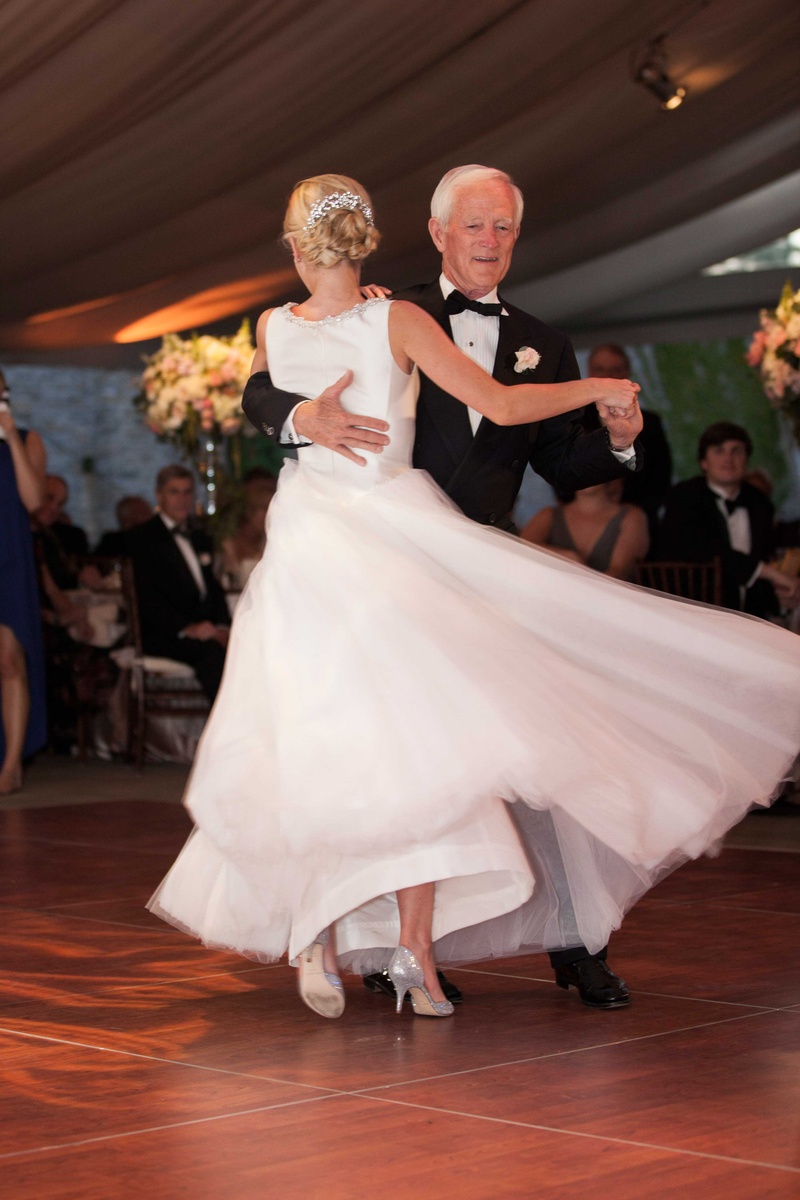 Bride Twirls During Father/Daughter Dance
Photography: Michael Bambino %26 Co.
Read More:
http://www.insideweddings.com/weddings/whimsical-open-air-secret-garden-wedding-with-soft-spring-hues/777/ a bride twirls in her full tulle skirt during the father daughter dance at her reception
