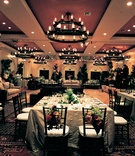 Rustic Autumn Ballroom
Photography: Yvette Roman Photography
Read More:
http://www.insideweddings.com/weddings/autumn-inspired-wedding-in-ojai-valley-california/217/ amber ballroom with white tables and red and green floral centerpieces