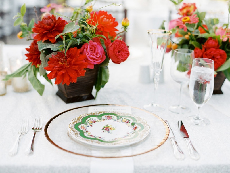 Colorful China Atop Gold-Rim Charger Plate
Photography: Ryan Ray Photography
Read More:
http://www.insideweddings.com/weddings/outdoor-wedding-with-vibrant-pink-orange-decor-in-california/723/ Green colorful china plate on top of clear gold rim charger at outdoor wedding