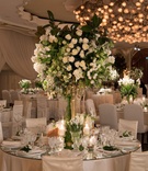 Mirror Table with High Centerpiece
Photography: John Solano Photography
Read More:
http://www.insideweddings.com/weddings/an-opulent-garden-ceremony-ballroom-reception-in-beverly-hills/986/ Ballroom wedding reception round table mirror with high centerpiece white flower greenery candles