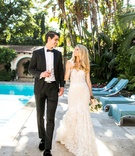 Poolside Couple with Champagne
Photography: Samuel Lippke Studios
Read More:
http://www.insideweddings.com/weddings/tuscany-meets-rustic-california-outdoor-wedding-under-the-stars/1336/ wedding portrait bride and groom at hotel bel-air pool with flute of champagne california wedding