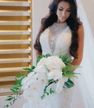 Cascading Tropical Bouquet
Photography: Kevin Le Vu Photography
Read More:
http://www.insideweddings.com/weddings/california-rooftop-wedding-with-a-modern-twist-on-old-hollywood/1159/ bridal bouquet with white Phalaenopsis orchids, ferns, tropical leaves, greenery