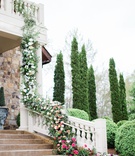 Florals Cascading Down Bannister
Photography: Rebecca Cerasani
Read More:
http://www.insideweddings.com/weddings/fairy-tale-romance-inspiration-with-abundance-of-bright-florals/1356/ 2400 on the river wedding, garland of flowers and greenery trails from balcony down bannister