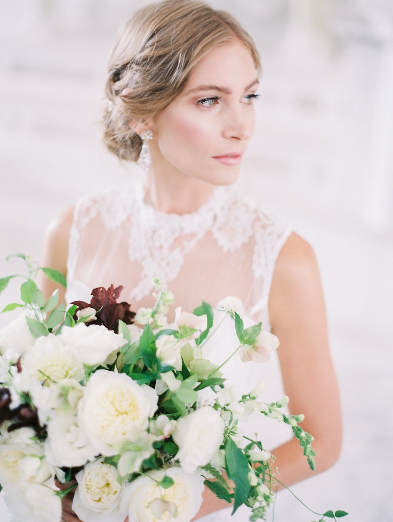 Large Handpicked Bridal Bouquet
Photography: Steve Torres Photography
Read More:
http://www.insideweddings.com/weddings/romantic-inspirational-shoot-at-a-historic-venue-in-downtown-la/724/ Bride in a JINZA Couture Bridal dress with chantilly lace, updo, bouquet of white flowers, greenery