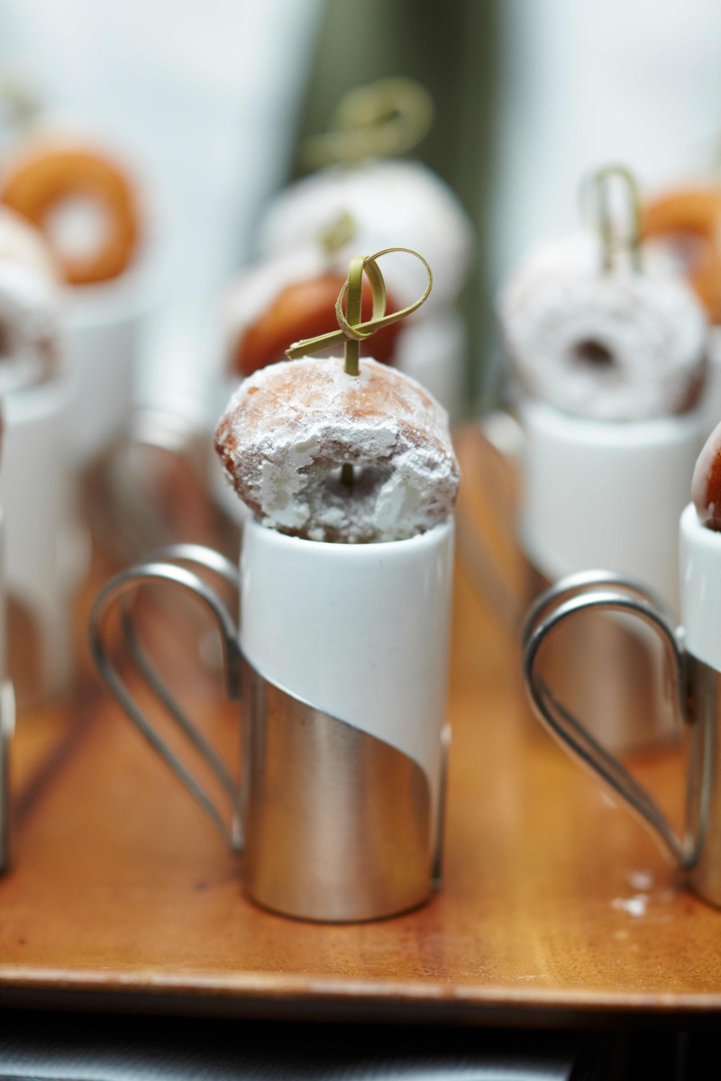 Powdered Donut Treats
Photography: Cooper Carras Photography
Read More:
http://www.insideweddings.com/weddings/classic-winter-white-wedding-in-wine-country/417/ Silver and white mug topped with powder sugar