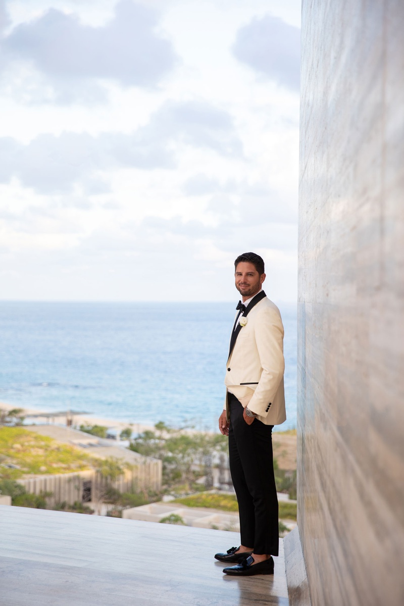 Groom in Alabaster Tux Jacket
Photography: Collin Pierson Photography
Read More:
http://www.insideweddings.com/weddings/beach-wedding-ceremony-romantic-reception-inspiration-in-cabo/1304/ wedding portrait groom at cabo resort white tuxedo jacket loafers no socks black pants