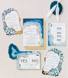 Agate-Inspired Paper Goods
Photography: Rachel Havel Photography
Read More:
http://www.insideweddings.com/weddings/unique-boho-chic-wedding-inspired-by-blue-agate-in-colorado/1362/ invitation suite inspired by blue agate with gold details