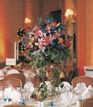 Pink and Blue Centerpiece
Photography: Shannon’s Photography
Read More:
http://www.insideweddings.com/weddings/summer-wedding-with-garden-inspired-decor-in-california/50/ Colorful flower arrangement on tables