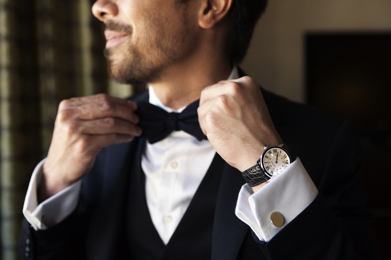 Classic Groom Look
Photography: Catherine Hall Studios
Read More:
http://www.insideweddings.com/weddings/metropolitan-san-francisco-wedding-at-luxury-hotel/411/ Man wearing tuxedo and bow tie with cuff links