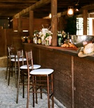 Rustic Wedding Bar
Photography: frame.thirty.six photography
Read More:
http://www.insideweddings.com/weddings/thea-andrews-and-jay-wolf/231/ Barstools at rustic country bar for barn wedding
