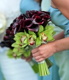 Colorful Bridesmaid Bouquet
Photography: Hoffmann Photographer
Read More:
http://www.insideweddings.com/weddings/colorful-summer-wedding-at-st-regis-monarch-beach/361/ Bridesmaids holding orchid and calla lily blossoms