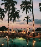Oceanfront Reception at Sunset
Photography: Tony Florez Photography
Read More:
http://www.insideweddings.com/weddings/colorful-destination-wedding-at-el-careyes-resort-spa-in-mexico/57/ Illuminated palm trees and a live band with view