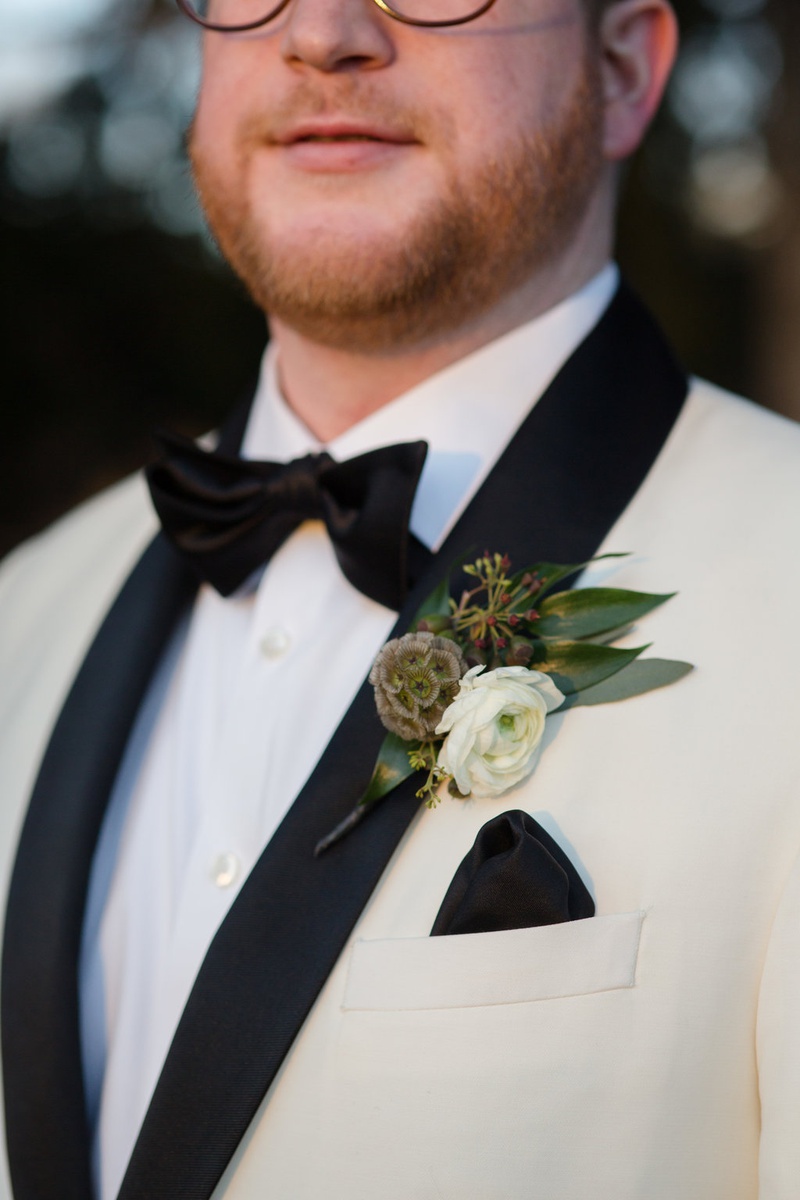 Ranunculus and Scabiosa Pod Boutonniere
Photography: Studio This Is
Read More:
http://www.insideweddings.com/weddings/whimsical-wedding-in-chicago-with-inspiration-from-national-parks/1272/ unique boutonniere ideas, boutonniere with a white ranunculus, scabiosa pod, leaves