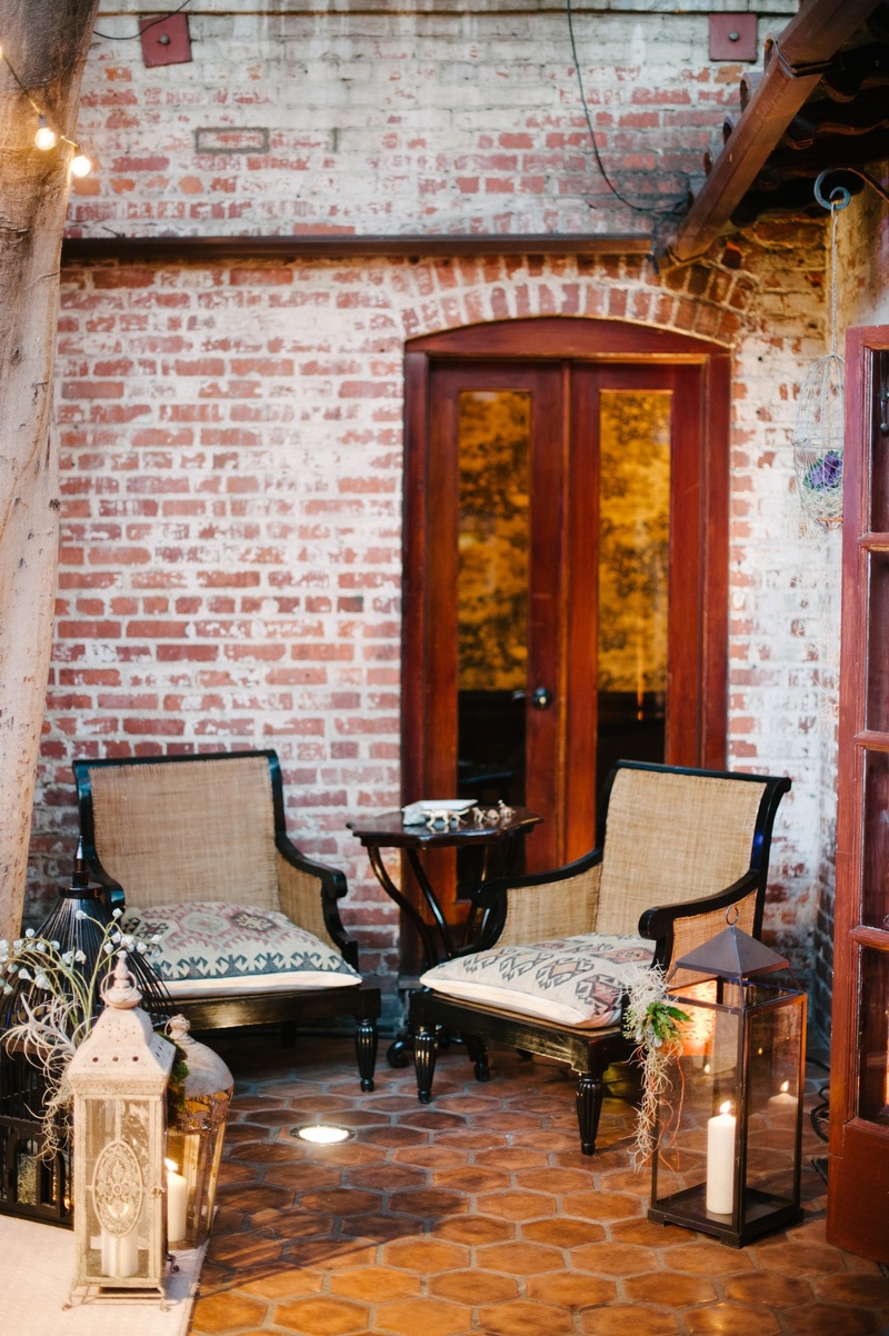 Brick Wall Lounge
Photography: Heather Kincaid
Read More:
http://www.insideweddings.com/weddings/monique-lhuillier-operations-manager-hannah-lyons-unique-wedding/565/ Armchairs on tile floor with brick walls and lantern decorations