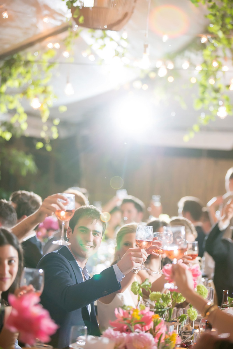 Toast at Rehearsal Dinner
Photography: Maya Myers Photography
Read More:
http://www.insideweddings.com/weddings/colorful-tented-rehearsal-dinner-with-garden-elements-in-brooklyn/1188/ rehearsal dinner inspiration, rehearsal dinner table decorated with flowers and fruit, toasts