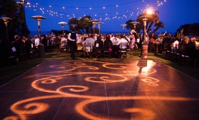 Oceanfront Reception Space
Photography: lunaphoto
Read More:
http://www.insideweddings.com/weddings/organic-oceanside-wedding-in-malibu-california/350/ Illuminated dance floor and twinkling lights over tables