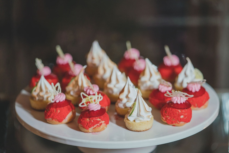 Custom Dessert Display
Photography: LuxRox
Read More:
http://www.insideweddings.com/weddings/alfresco-inspired-luxurious-hotel-wedding-in-washington-dc/1312/ meringue desserts strawberry vanilla tarts on white tray at dessert table display wedding reception