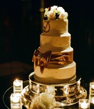 Round Bow Wedding Cake
Photography: Riccis Valladares Photography
Read More:
http://www.insideweddings.com/weddings/elegant-fall-wedding-at-the-breakers-in-palm-beach-florida/260/ Four layer wedding cake dotted with pearls