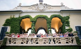 Wedding Guests on Terrace
Photography: Corbin Gurkin Photography
Read More:
http://www.insideweddings.com/weddings/pink-summer-destination-wedding-in-lake-como-italy/321/ Bride and groom with family and friends on balcony