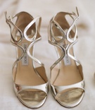 Metallic Wedding Sandals
Photography: Liz Banfield and Adrienne Page
Read More:
http://www.insideweddings.com/weddings/glittering-gold-new-years-eve-celebration-in-oklahoma-city/614/ Jimmy Choo silver strappy sandal shoes