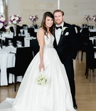 Bride %26 Groom in Presidential Library
Photography: Sterling Imageworks
Read More:
http://www.insideweddings.com/weddings/sophisticated-soiree-at-a-presidential-library-in-little-rock/1033/ Wedding portrait in venue space ballroom wood floor black chairs purple white flowers wedding dress