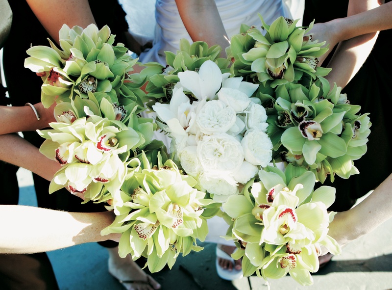 Green and White Bouquets
Photography: Tamara Lackey Photography
Read More:
http://www.insideweddings.com/weddings/lime-green-hued-fall-wedding-in-south-carolina/219/ Bride's bouquet in middle of bridesmaid nosegays