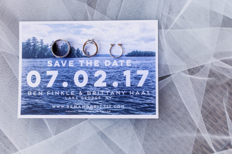 Modern Save the Date with Lake Photo
Photography: Amy Anaiz Photography
Read More:
http://www.insideweddings.com/weddings/lakeside-wedding-with-blue-details-in-upstate-new-york/1140/ save the date card with modern font, photo of lake george, new york