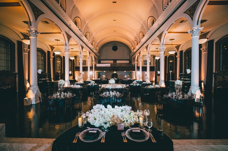 Wintry Décor at Vibiana in LA
Photography: Jimmy Bui Photography
Read More:
http://www.insideweddings.com/weddings/elegant-edgy-wedding-inspired-by-disney-at-vibiana-in-downtown-la/1229/ wedding reception sweetheart table with view of guests at vibiana white columns black white decor