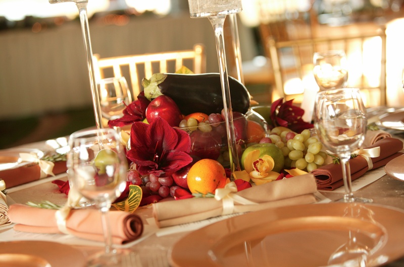 Cornucopia Centerpiece
Photography: Mark Staff Photography
Read More:
http://www.insideweddings.com/weddings/autumn-inspired-golf-club-wedding-in-south-carolina/149/ Fall themed centerpiece with fruit and vegetables