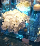 Glass Orchid Vase
Photography: Dalal Photography
Read More:
http://www.insideweddings.com/weddings/turquoise-oceanfront-wedding-at-the-montage-laguna-beach/243/ orchids and floating candle in glass square vases with blue lighting