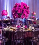 Tall Fuchsia Centerpiece
Photography: Brian Leahy Photography
Read More:
http://www.insideweddings.com/weddings/a-hawaiian-couples-luxurious-destination-wedding-in-las-vegas/1226/ translucent smoke grey chairs, velvet eggplant linens, fuchsia orchids tall centerpieces