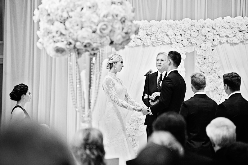 Black and White Photo of Bride and Groom Exchange Vows
Photography: Carasco Photography
Read More:
http://www.insideweddings.com/weddings/new-york-yankees-infielder-marries-in-opulent-chicago-soiree/764/ rob refsnyder of new york yankees exchanging vows with bride at The Drake Hotel