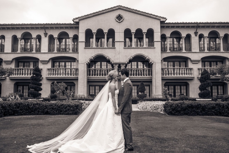 Bride %26 Groom in Front of Hotel Venue
Photography: Triple Cord Photography
Read More:
http://www.insideweddings.com/weddings/destination-wedding-with-outdoor-reception-lavish-after-party/982/ Black and white photo of bride and groom in front of grand del mar in san diego california wedding