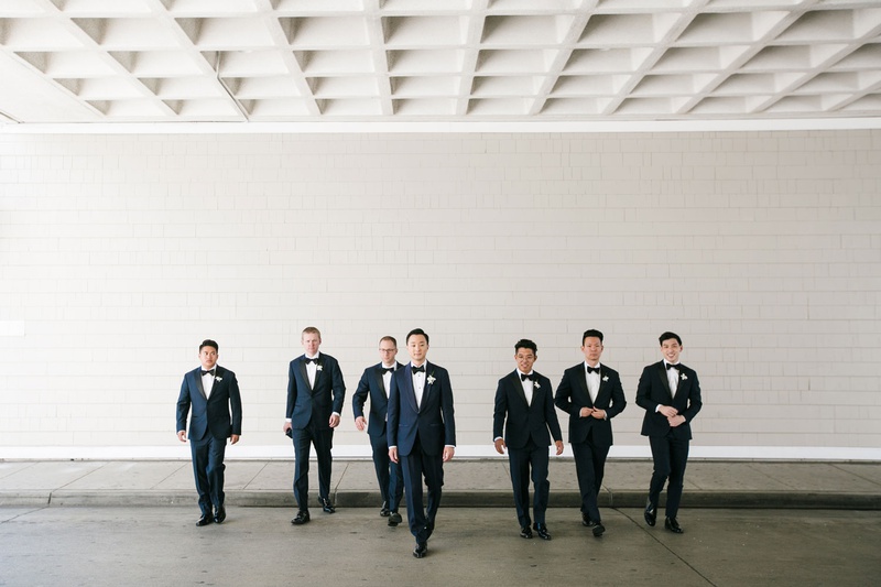 Santa Monica Groomsmen in Bow Ties
Photography: Michelle Beller Photography
Read More:
http://www.insideweddings.com/weddings/classic-ceremony-beachfront-ballroom-reception-in-santa-monica/1234/ groom and groomsmen walking toward camera with bow ties and boutonnieres