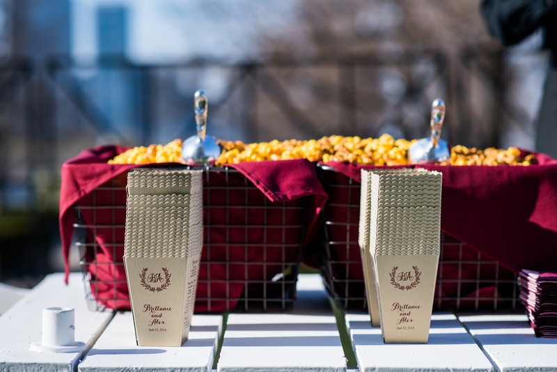 Popcorn Bar with Personalized Boxes
Photography: Kent Drake Photography
Read More:
http://www.insideweddings.com/weddings/an-event-planners-wedding-at-a-museum-by-sue-the-tyrannosaurus-rex/955/ Popcorn box with monogram and couple names wedding ideas popcorn bar cocktail hour