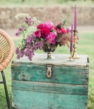 Vintage Teal Trunk, Purple Floral Arrangement
Photography: Lucas Rossi Photography
Read More:
http://www.insideweddings.com/weddings/bold-boho-chic-inspirational-outdoor-wedding-in-malibu-california/990/ vintage teal trunk purple floral arrangement california boho chic wedding styled shoot lounge candle
