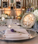 Vintage-Inspired Tablescape
Photography: Next Exit Photography
Read More:
http://www.insideweddings.com/weddings/melissa-claire-egan-and-matthew-katrosar/588/ Silver mirror table number at Melissa Claire Egan's wedding