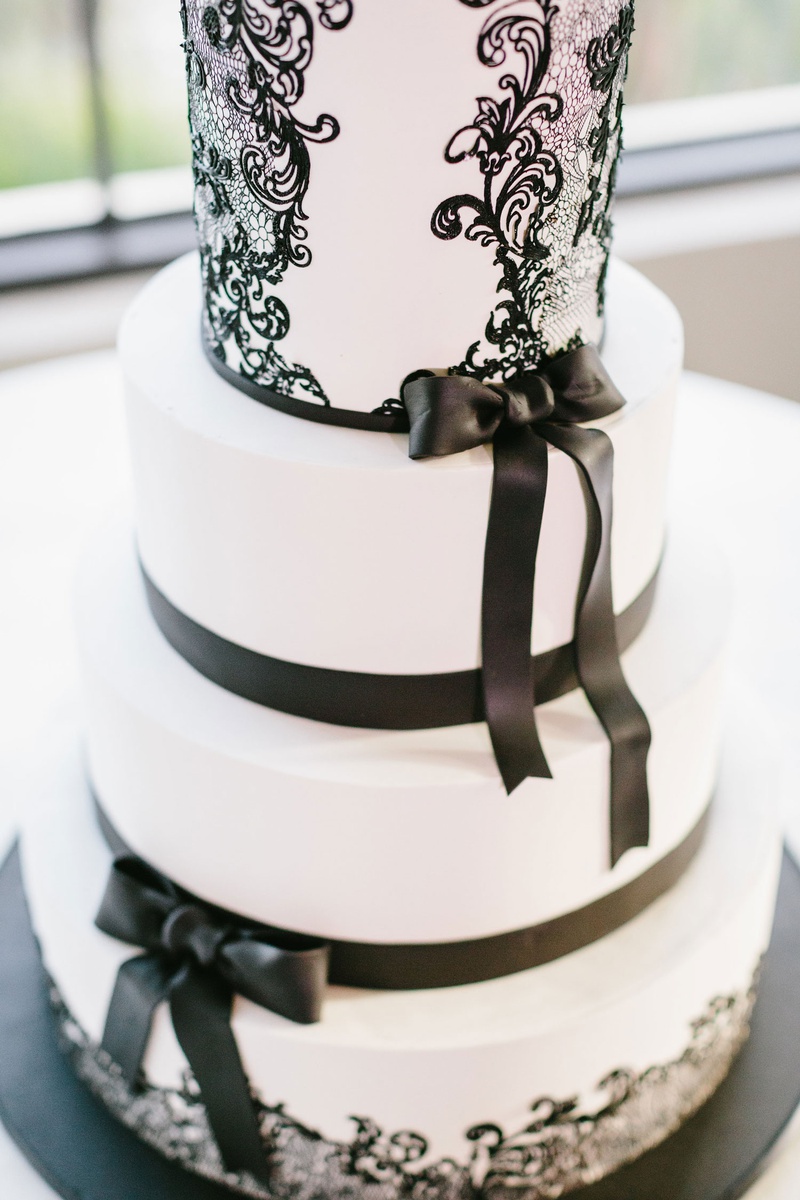 White %26 Black Cake with Bows
Photography: Jodee Debes Photography
Read More:
http://www.insideweddings.com/weddings/elegant-alfresco-ceremony-reception-with-parisian-elements/1176/ Wedding cake fondant with black bow detail and lace design swirl contemporary modern cake ideas