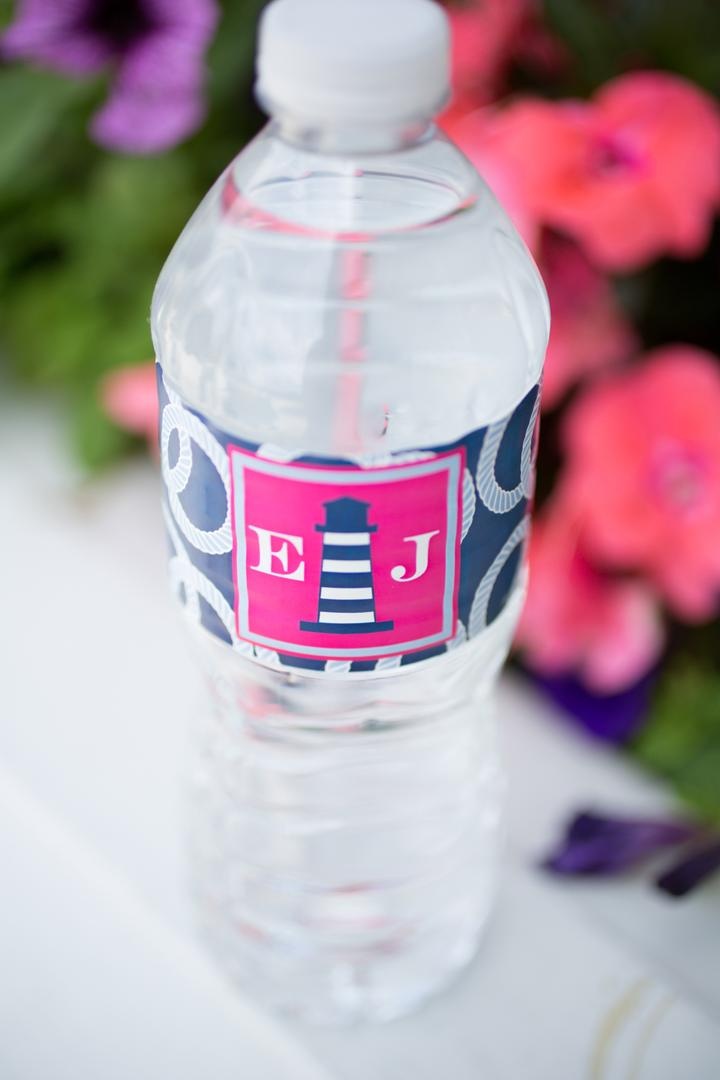 Monogram Water Bottle
Photography: Carrie Rodman Photography
Read More:
http://www.insideweddings.com/weddings/new-england-summer-wedding-by-the-seashore/429/ Pink and navy blue water bottle label with lighthouse design