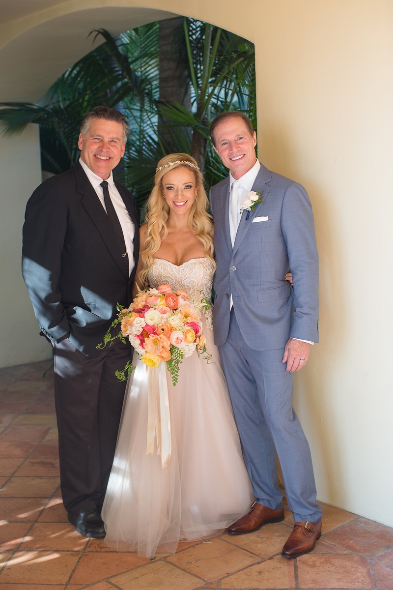Bride %26 Groom with Officiant
Photography: Ashley Paige Photography
Read More:
http://www.insideweddings.com/weddings/romantic-ocean-view-ceremony-charming-reception-in-california/1337/ bride in strapless trish peng wedding dress groom in grey suit and reverend clint hufft portrait