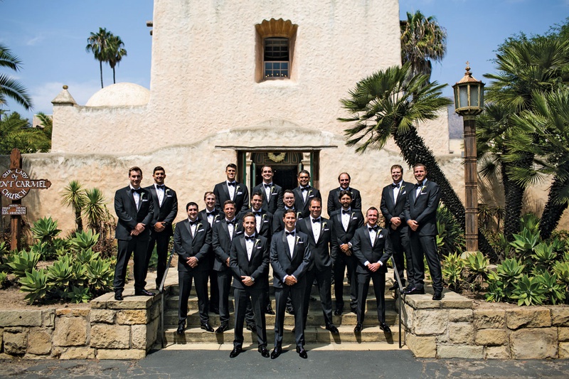 Groomsmen in Front of Church
Photography: Samuel Lippke Studios
Read More:
http://www.insideweddings.com/weddings/classic-catholic-ceremony-elegant-reception-in-santa-barbara/1317/ large group of groomsmen in tuxedos posed in front of old mission church