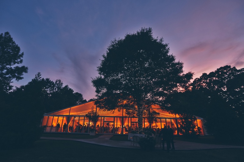 Tented Reception at Dusk
Photography: David %26 Tammy Molnar
Read More:
http://www.insideweddings.com/weddings/an-exquisite-backyard-wedding-in-tennessee/532/ Illuminated backyard tent and trees at sunset