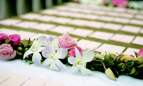 Place Card Table
Photography: Kavan Photographic Art
Read More:
http://www.insideweddings.com/weddings/bridesmaid-dress-designer-jenny-yoos-sisters-california-wedding/114/ Pink rose and white orchid garland for wedding reception place card table