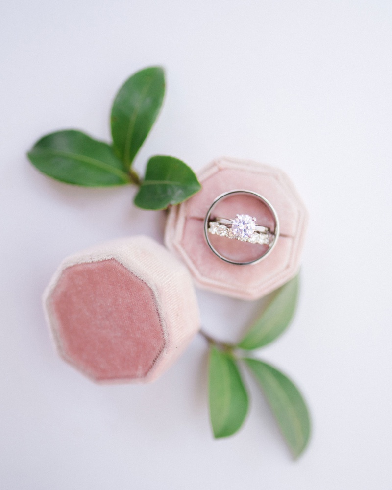 Solitaire Engagement Ring in Pink Box
Photography: Anya Kernes Photography
Read More:
http://www.insideweddings.com/weddings/outdoor-wedding-with-dusty-rose-powder-blue-lavender-palette/1288/ wedding rings eternity band and solitaire engagement ring pink velvet ring box greenery
